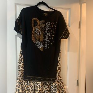 Beautiful dress. Black with animal print.  In addition same print purse.  TATU